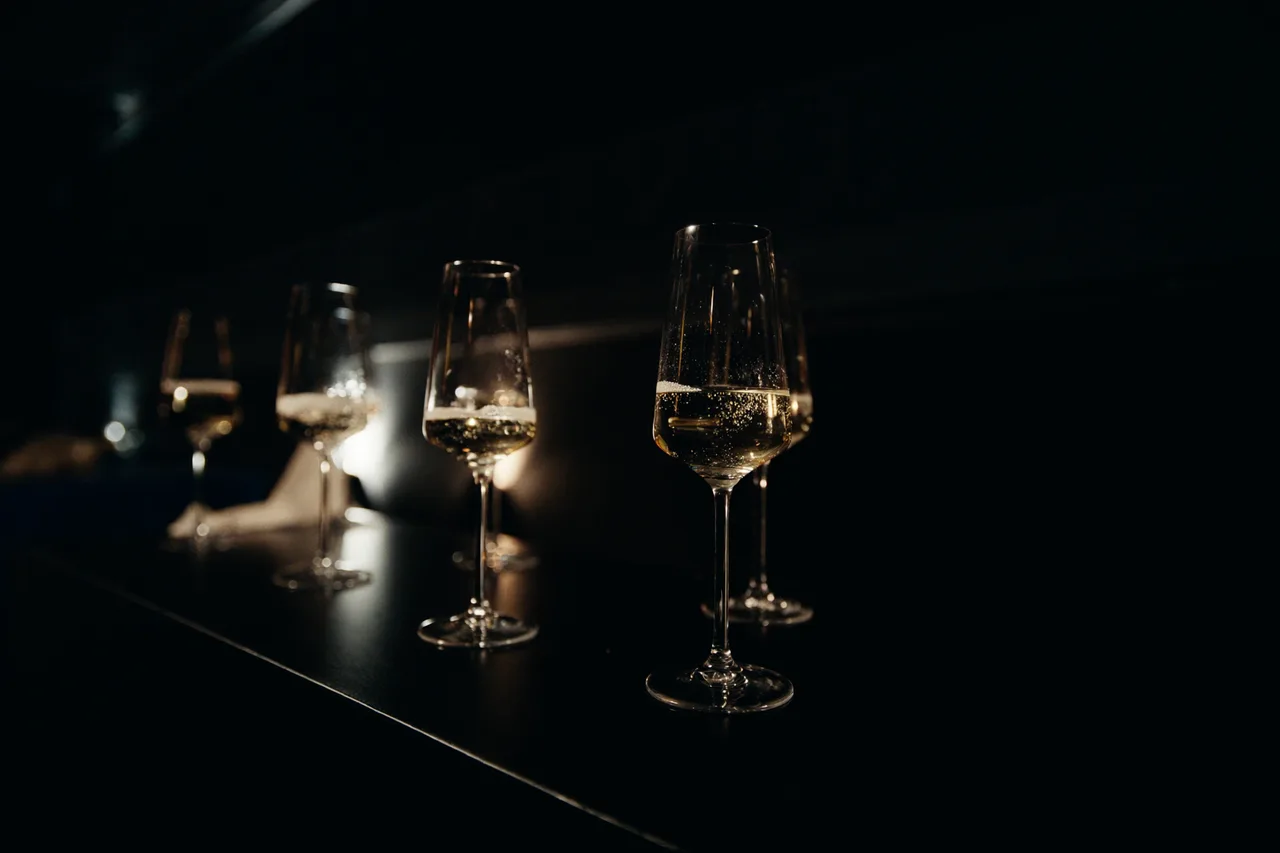Sparkling-wine reception in warm golden light