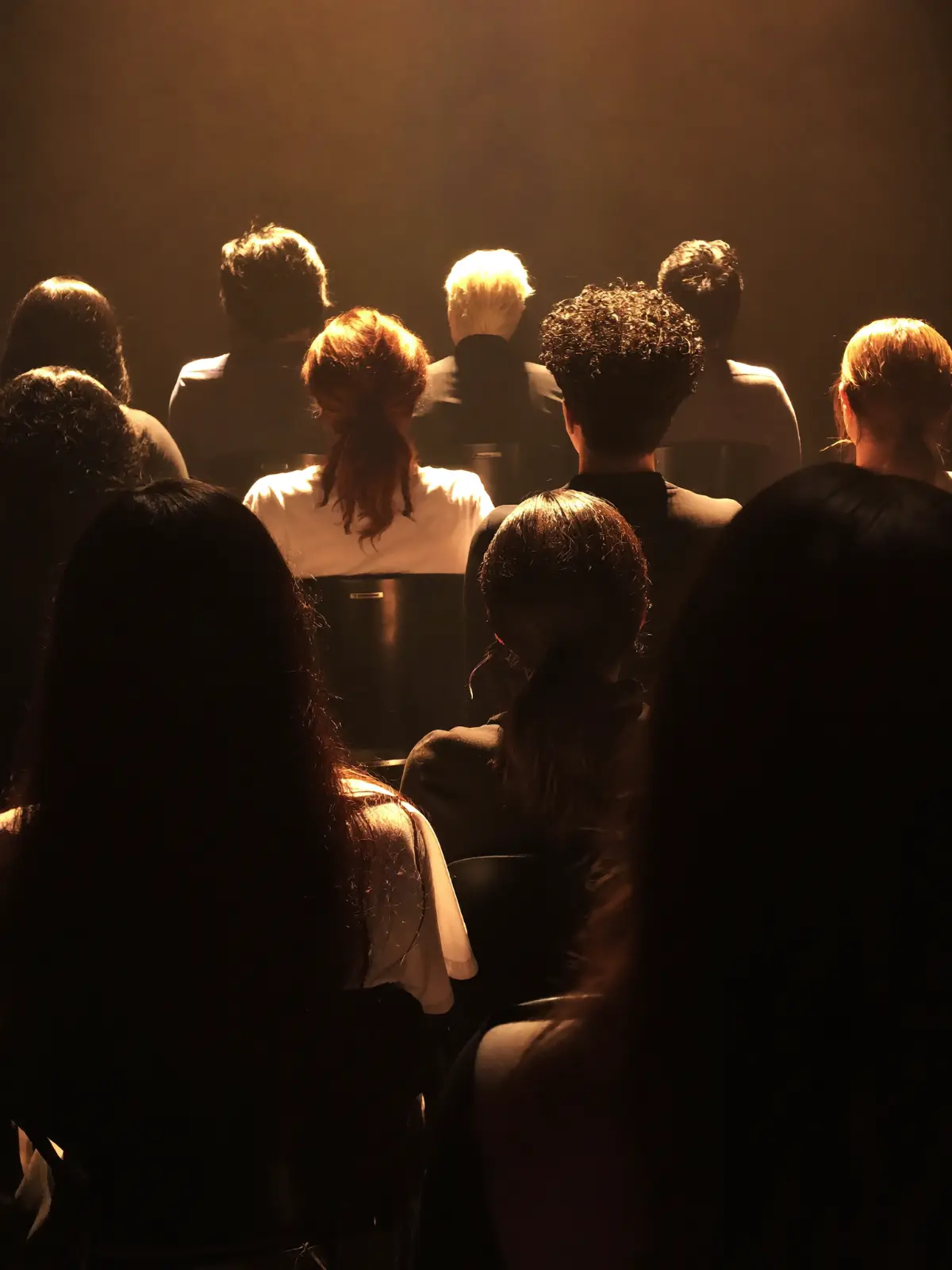 Audience in warm raking light